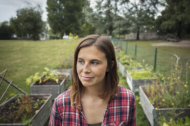 Thoughtful mid adult woman in vegetable garden - MASF02017