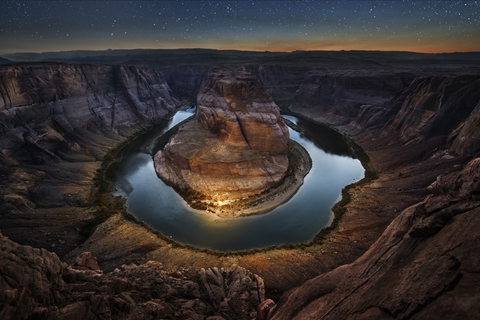 Scenic view of Horseshoe Bend against star field at night stock photo