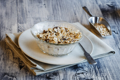 Glass bowl of homemade granola - EVGF03348