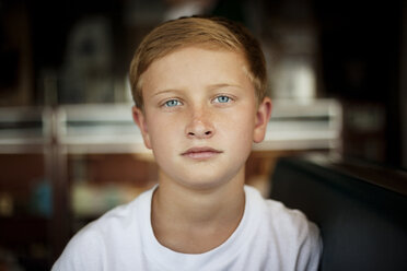 Portrait of cute boy relaxing at home - CAVF36281