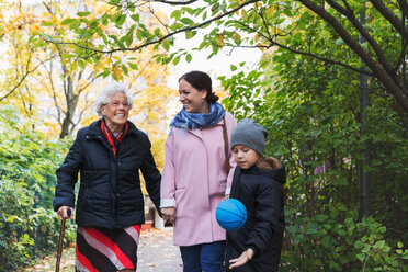 Happy senior woman with daughter and great grandson in park - MASF03073