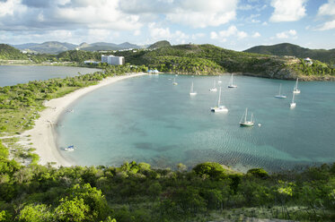 High angle view of boats moored in sea against mountain - CAVF36680