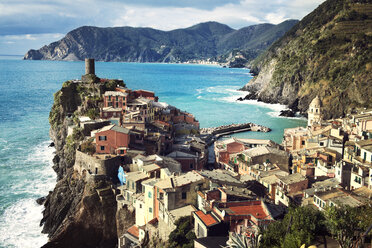 High angle view of houses on mountains against sea - CAVF36784