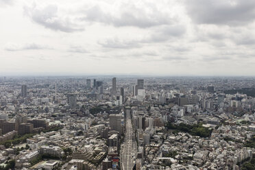 Aerial view of cityscape against cloudy sky - CAVF36991