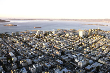 Aerial view of cityscape and bay against clear sky - CAVF37511