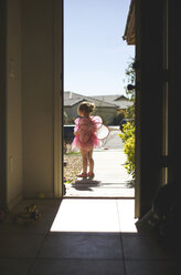 Girl wearing fairy costume seen from doorway - CAVF37701