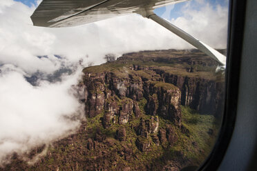 Rocky mountains seen through airplane window - CAVF37970