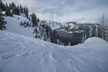 High angle view of Wizard Island at Crater Lake National Park during winter - CAVF38667