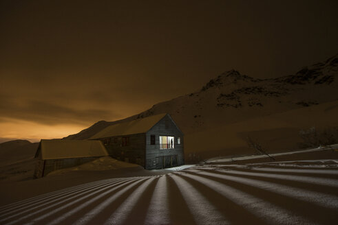 View of Independence Mine State Park against mountains during night - CAVF38705