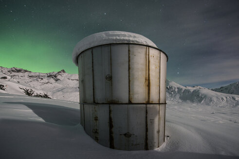 Metallic containers on snow covered land at independence mine state park - CAVF38712