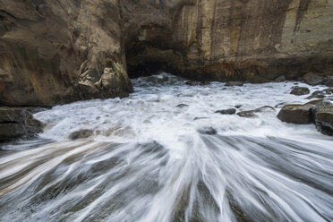 Idyllic view of flowing water in cave at Cape Kiwanda State Natural Area - CAVF38730