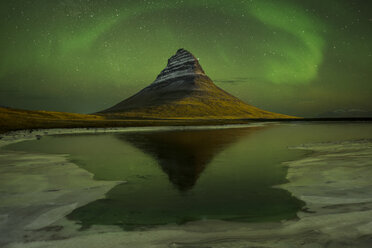 Scenic view of northern lights over mountain peak - CAVF39001
