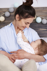Mother breastfeeding her baby - ABIF00301