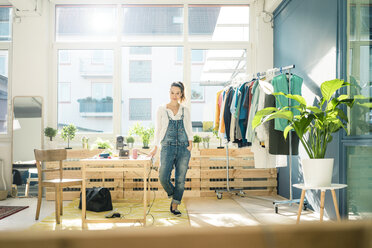 Fashion designer standing in her studio - MOEF01006