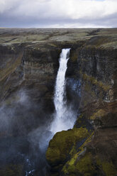 Scenic view of Haifoss waterfall against cloudscape - CAVF40947