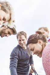 Low angle view of happy friends against sky - MASF04862