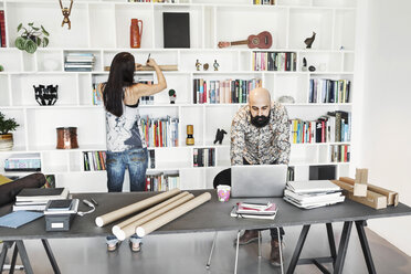 Male and female architects working at home office - MASF04880