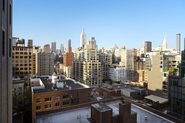 View of buildings in city against clear sky - CAVF42116