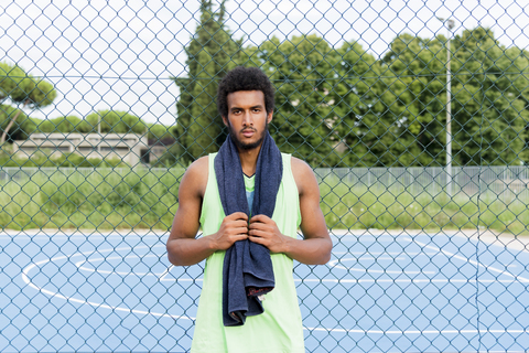 Young basketball player with towel stock photo