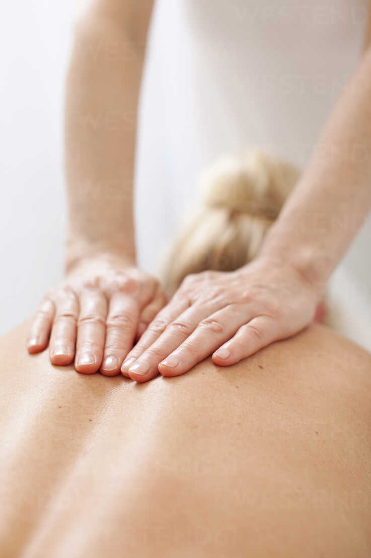 Woman Receiving Back Massage Stock Photo, Royalty-Free