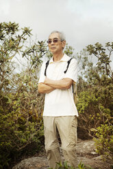 Senior man in tropical forest - CAVF44266