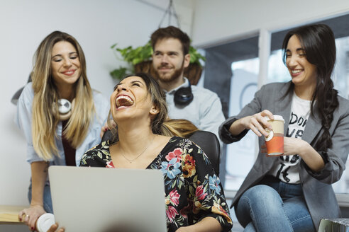 Happy casual coworkers in the office - OCAF00242