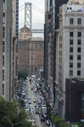 USA, California, San Francisco, California Street with Bay Bridge in the background - MKFF00353