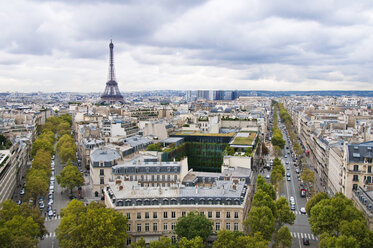 View Eiffel tower in city against cloudy sky - CAVF45692