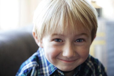 Portrait of smiling boy at home - CAVF45764