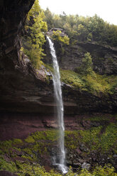 Scenic view of waterfall over rock formations - CAVF45882