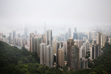 High angle view of Hong King skyline in foggy weather - CAVF46084