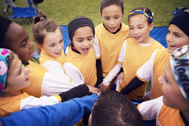 Soccer players huddling during match - CAVF46630