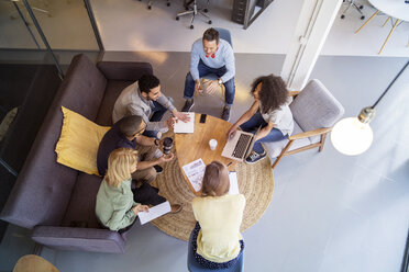 High angle view of business people discussing in meeting at office - CAVF47176