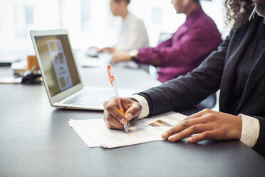 Business people working in board room - CAVF47217