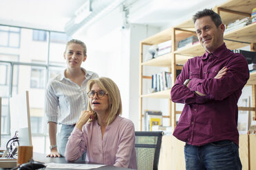 Business people discussing in board room - CAVF47239