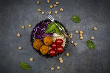 Couscous sweet potato falafel bowl with red cabbage, tomato, mint and hummus - LVF06885