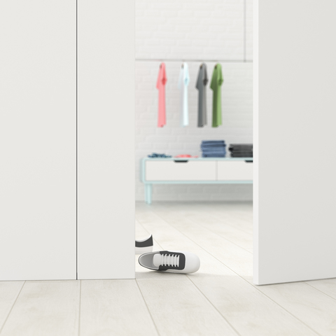 Cloakroom behind ajar door, 3d rendering stock photo