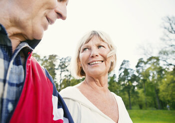 Elderly woman outside with man - MASF06981