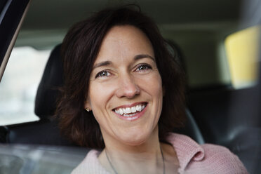 Closeup on happy woman in car - MASF07073