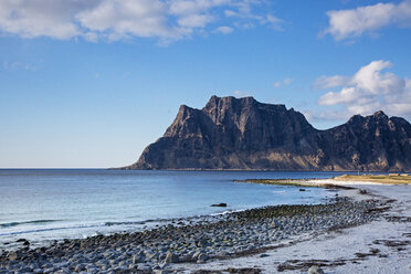 Craggy cliffs and remote ocean beach, Utakliev, Lofoten, Norway - CAIF20345