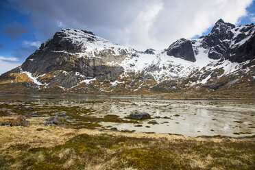 Snow on craggy, remote mountains, Flakstadpollen, Lofoten, Norway - CAIF20351