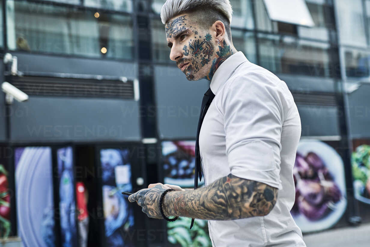 Young man tattoos business hi-res stock photography and images - Page 2 -  Alamy