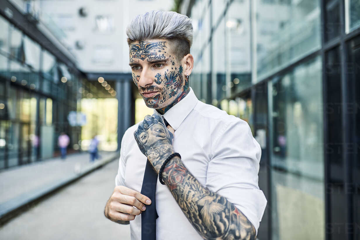 Businessman With Whole Body Covered In Tattoos Using Mobile In Office  High-Res Stock Photo - Getty Images