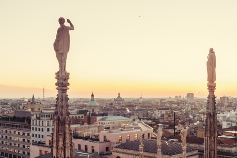 Italy, Lombardy, Milan, statues on the Milan Cathedral at the sunset stock photo