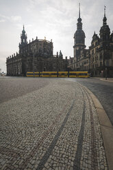 Germany, Saxony, Dresden, Theatre Square, Dresden Castle, Dresden Cathedral against the morning sun, tram - ASCF00861