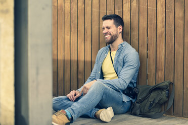 Young man laughing - JSMF00164