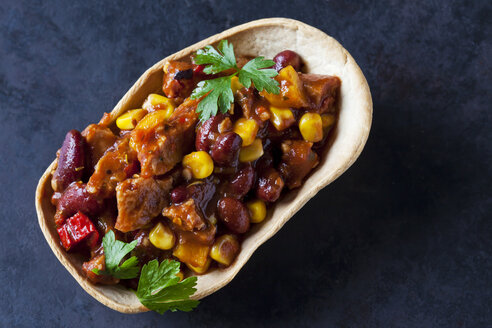 Vegetarian Chili with soy meat cut into strips in edible bowl - CSF29117