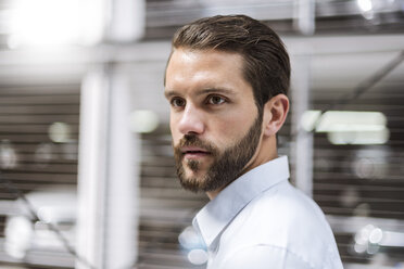 Portrait of bearded young businessman - DIGF04106