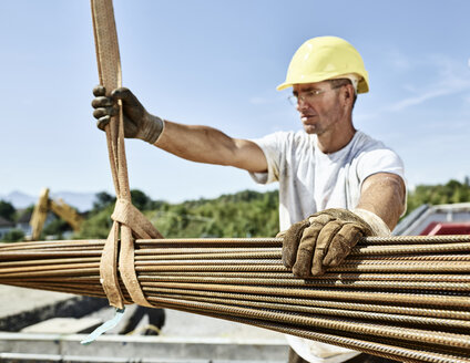 Construction worker with construction steel on construction site - CVF00338