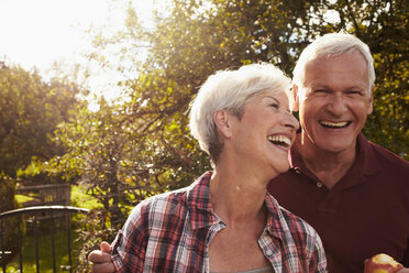 Senior couple in front of lake - CUF00324